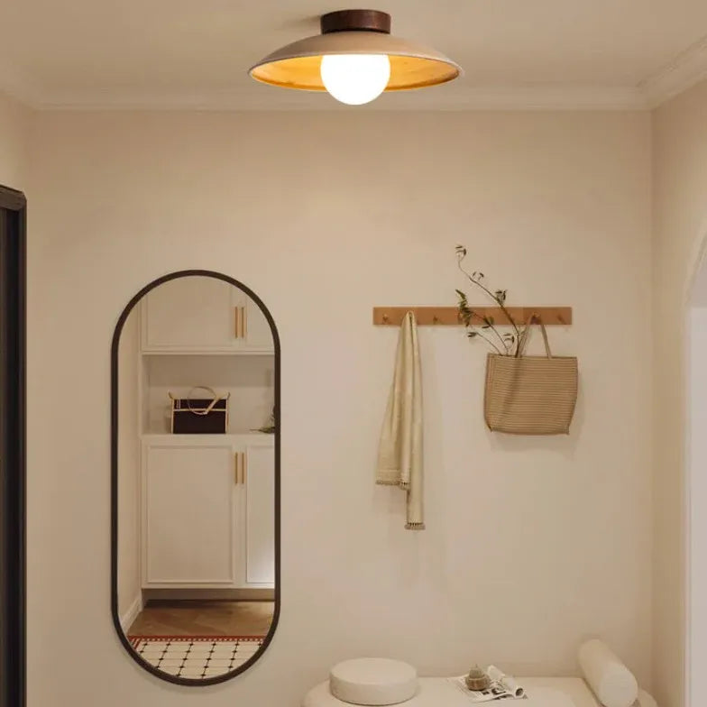 Spherical Warm-Toned Ceiling Light for Corridor